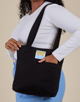 Over-Shoulder Zip Mini Tote in Basic Black worn on shoulder of model