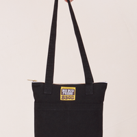 Over-Shoulder Zip Mini Tote in Black held by model