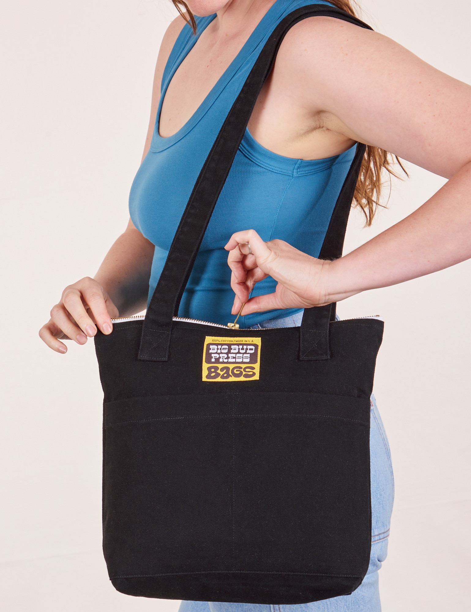 Over-Shoulder Zip Mini Tote in Black worn on shoulder