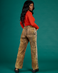 Angled back view of Kandia in the Leopard Work Pant
