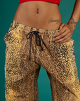 Close up on the waistband of the Leopard Drop Pocket Pant on Kira