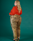 Angled back view of Juliet wearing the Leopard Work Pant