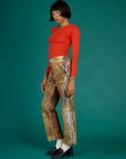 Kira wearing the Leopard Work Pant with the Chili Red Long Sleeve Baby Tee