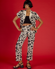 Kira wearing the Cow Work Pant with the matching Cow Pantry Button Up