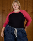 Juliet wearing the Black/Pink Colorblock Raglan Tee