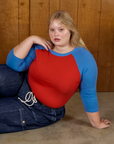 Juliet wearing the Mustang Red/Blue Colorblock Raglan Tee