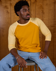 Isaac in the Mustard Yellow/Butter Raglan Tee