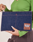 Big Pouch in Dark Wash Denim held by model