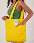 Everyday Tote in Golden Yellow worn on model's shoulder