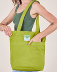 Everyday Tote Bag in Gross Green worn by model
