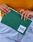 Pencil Pouch in Hunter Green held by model