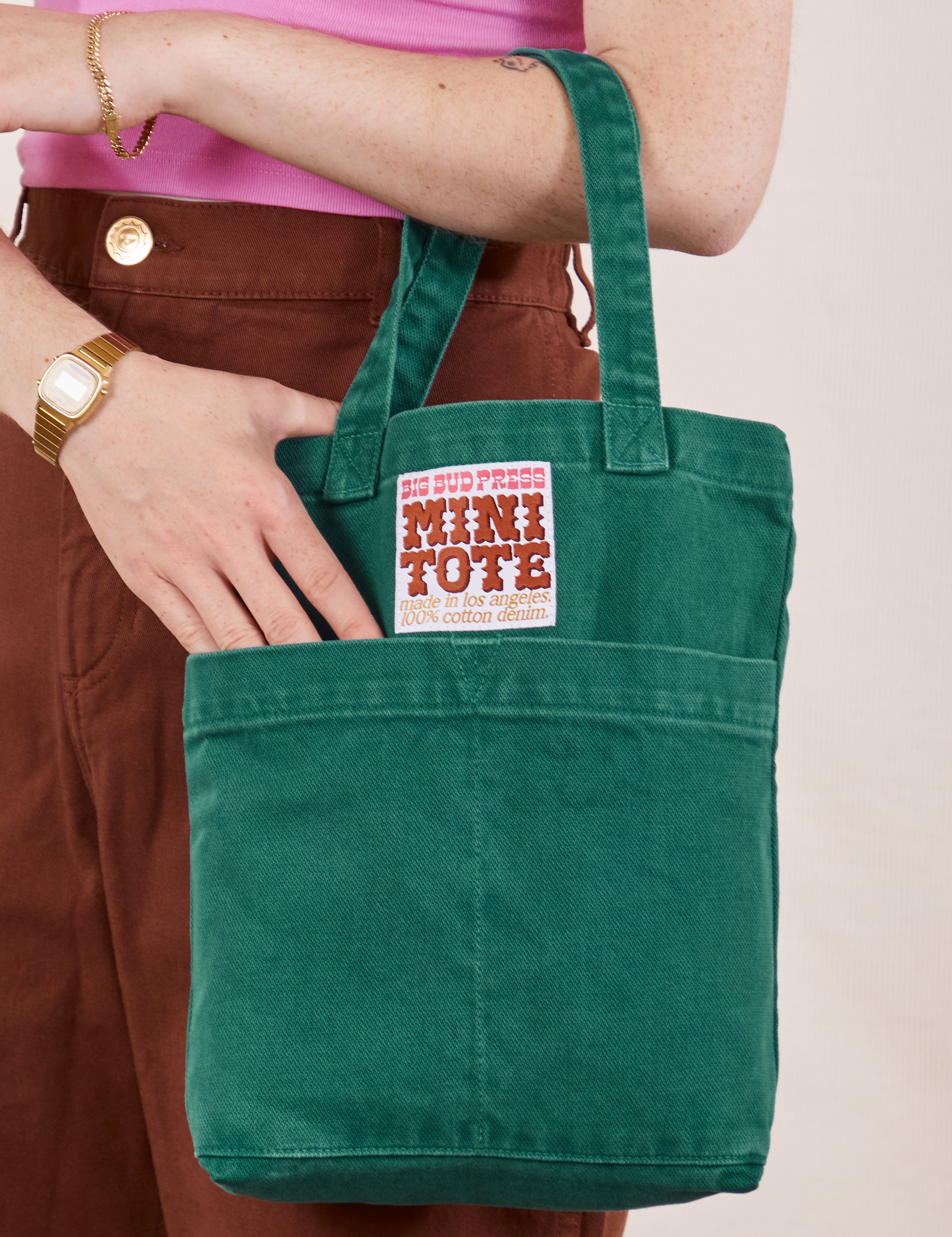 Mini Tote Bag in Hunter Green on Hana's arm