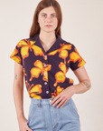 Scarlett is wearing Icon Pantry Button-Up in Butterfly
