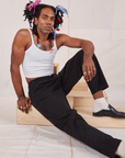 Jerrod is wearing Long Heavyweight Trousers Basic Black and Cropped Cami in vintage tee off-white