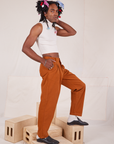 Side view of Heavyweight Trousers in Burnt Terracotta on Jerrod