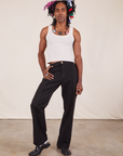 Jerrod is 6'3" and wearing M Long Western Pants in Basic Black paired with Tank Top in vintage tee off-white 