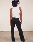 Back view of Western Pants in Basic Black and Tank Top in vintage tee off-white on Jerrod