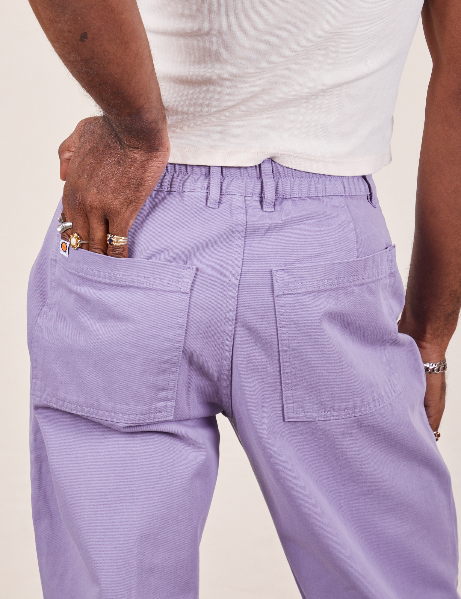 Western Pants in Faded Grape back close up on Jerrod