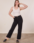 Allison is 5'10" and wearing Long S Work Pants in Basic Black paired with Tank Top in vintage tee off-white