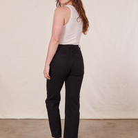 Work Pants in Basic Black back view on Allison wearing a vintage off-white Tank Top
