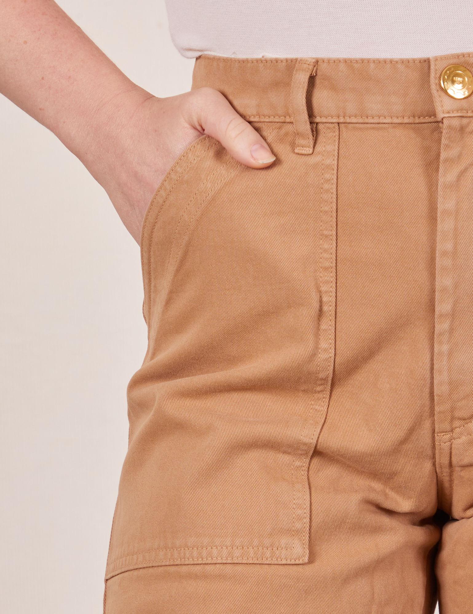 Front pocket close up of Work Pants in Tan worn by Allison