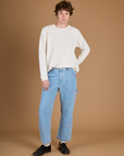 Quinn Wearing the Vintage Tee White Long Sleeve Burly Tee tucked into the Light Wash Carpenter Jeans