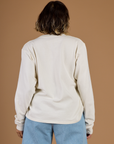 Back view of the Vintage Tee White Long Sleeve Burly Tee on Tiara