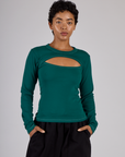 Mika is 5'3 and wearing P Hunter Green Long Sleeve Porthole Tee