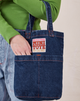 Denim Mini Tote Bag in Dark Wash on model's arm