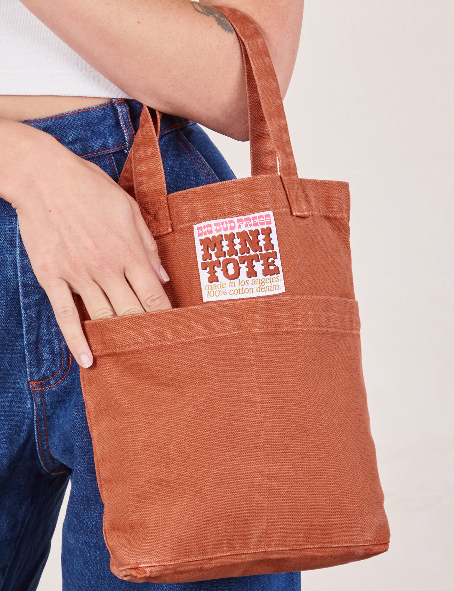 Mini Tote Bag in Clay Red on Alex's arm