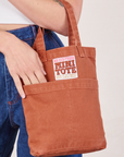 Mini Tote Bag in Clay Red on Alex's arm