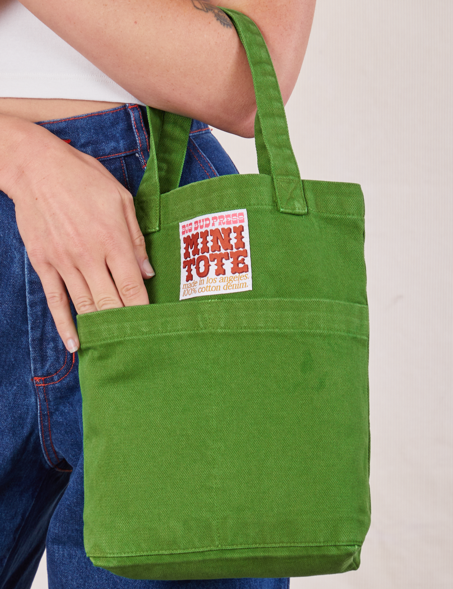 Lawn Green Mini Tote Bag on Alex's arm