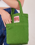Lawn Green Mini Tote Bag on Alex's arm