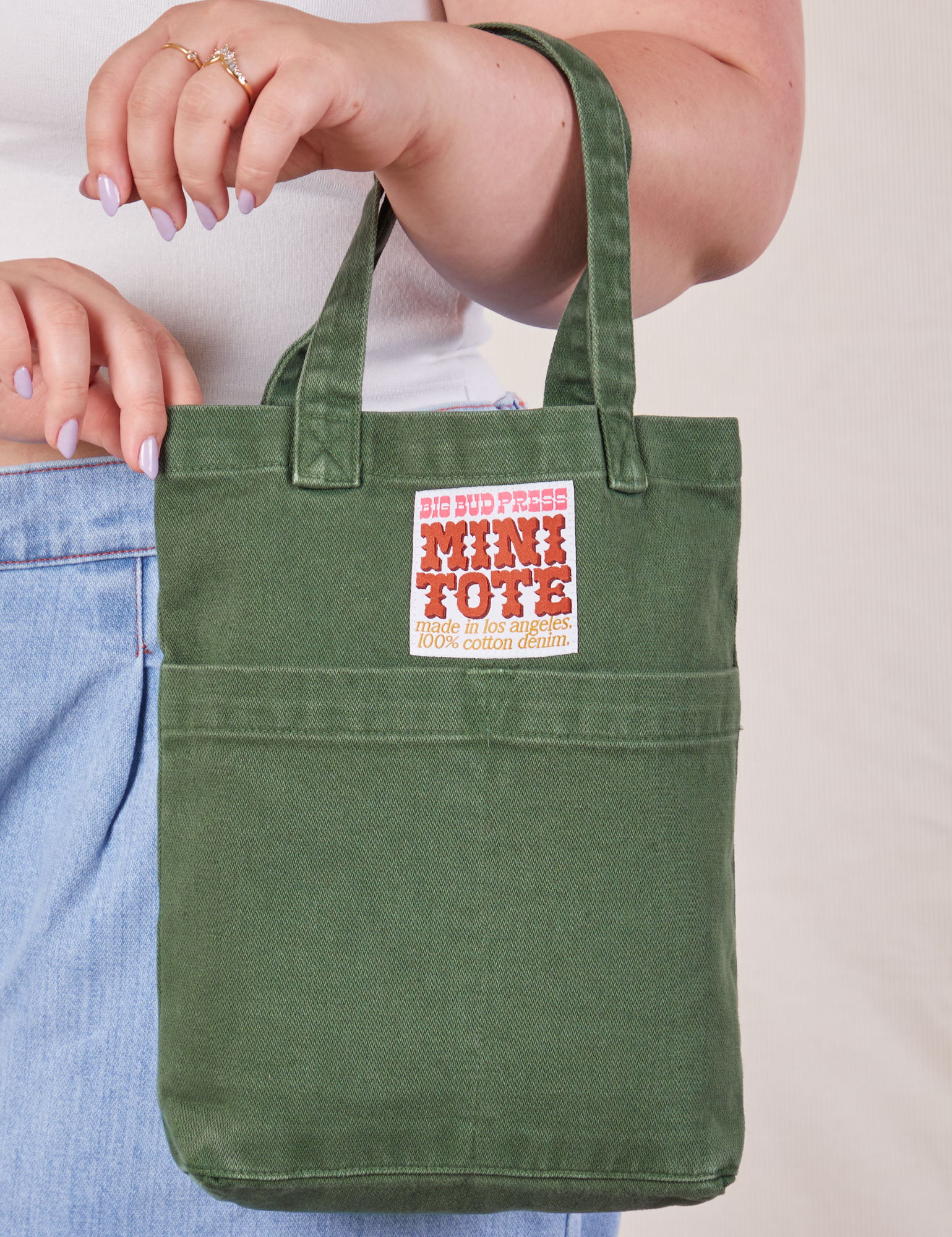 Dark Emerald Green Mini Tote Bag on Ashley's arm