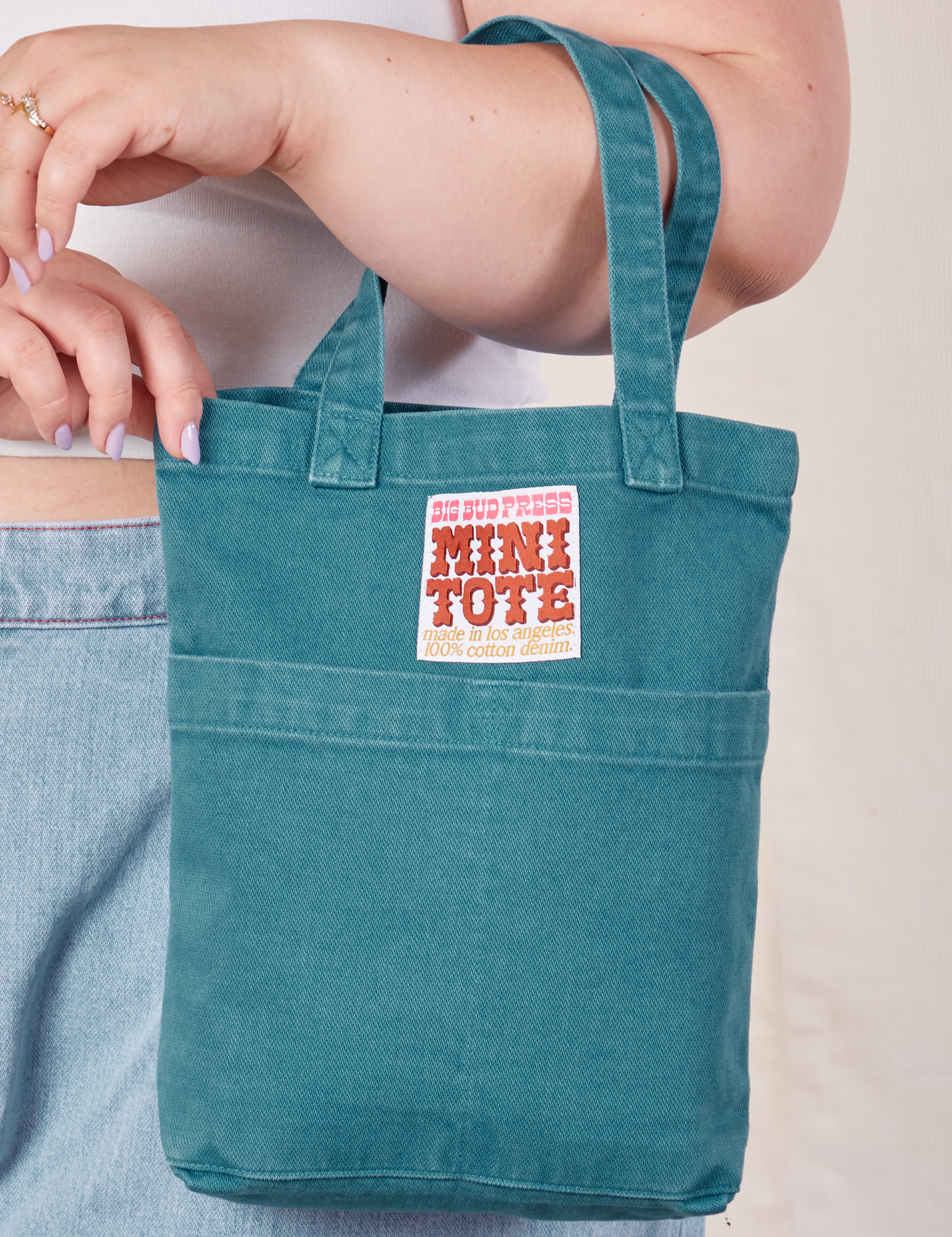 Marine Blue Mini Tote Bag on Ashley's arm