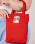 Mini Tote Bag in mustang red on Ashley's arm