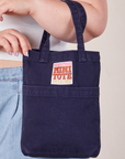 Navy Blue Mini Tote Bag on Ashley's arm