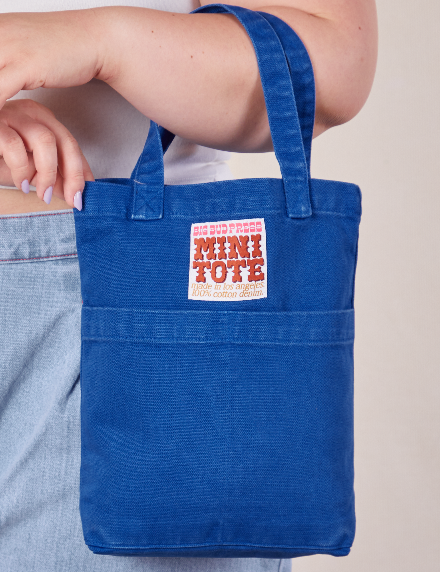 Royal Blue Mini Tote Bag on Ashley's arm