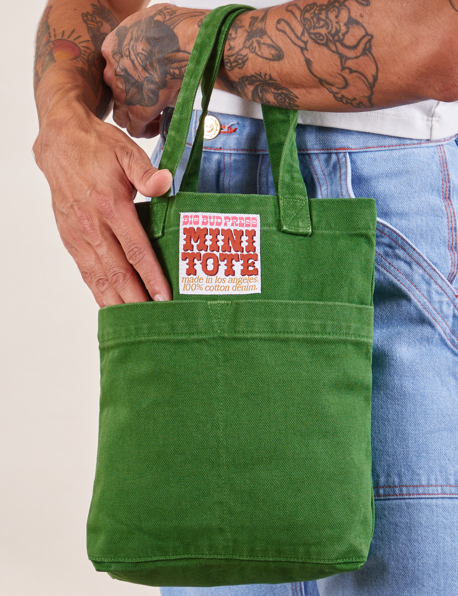 Mini Tote Bag in Forest Green on Jesse's arm
