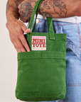 Mini Tote Bag in Forest Green on Jesse's arm