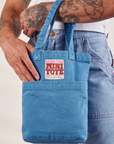 Greek Blue Mini Tote Bag on Jesse's arm
