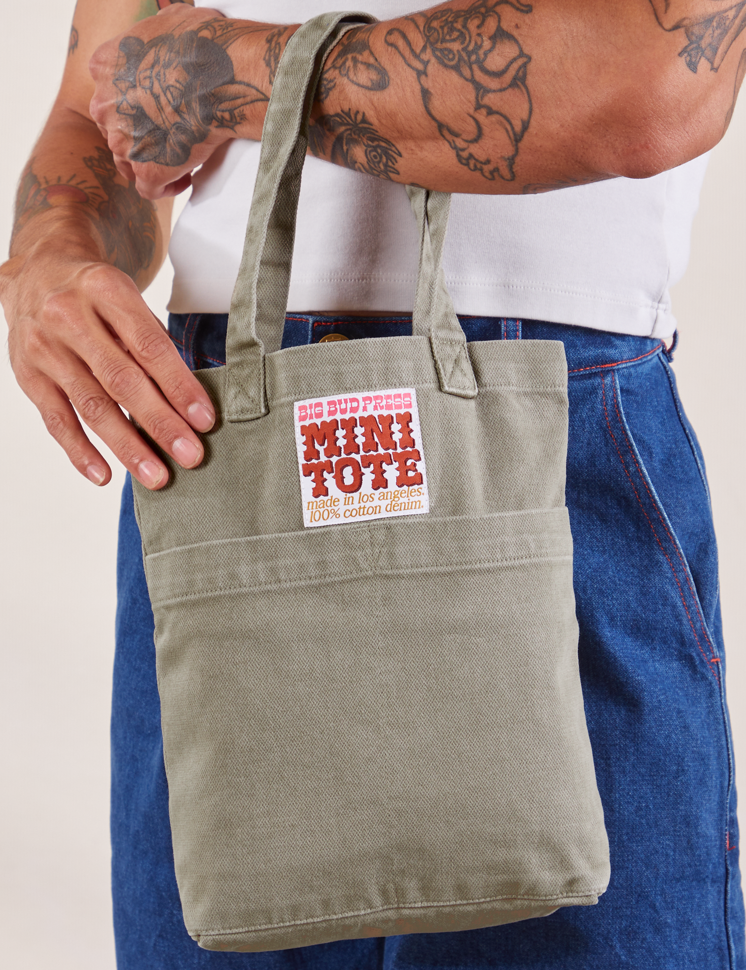 Khaki Grey Mini Tote Bag on Jesse's arm