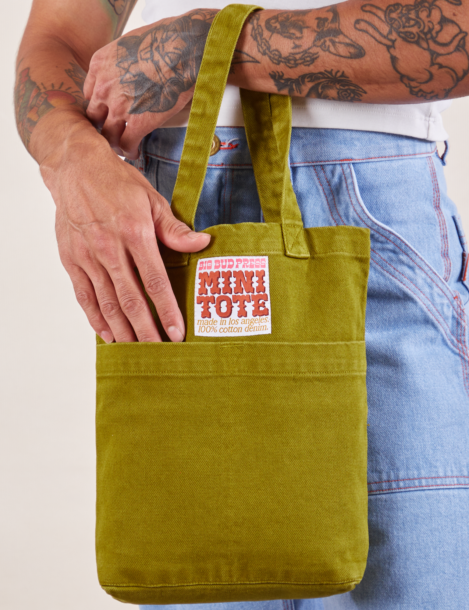 Mini Tote Bag in Olive Green on Jesse's arm