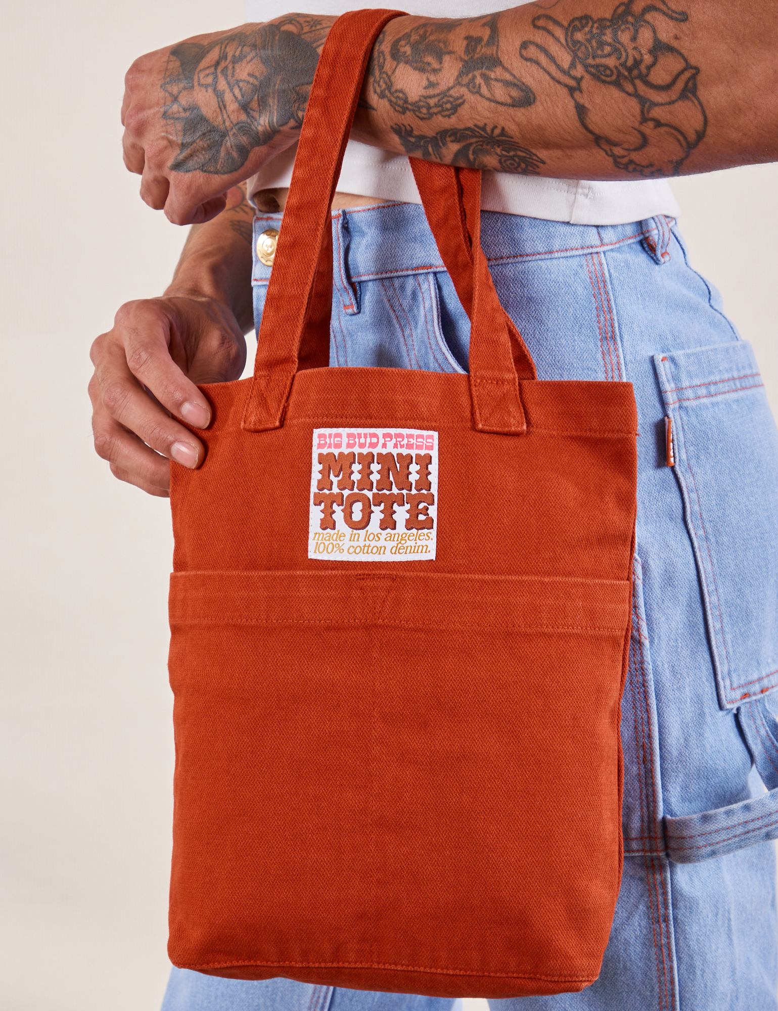 Mini Tote Bag in Paprika on Jesse's arm