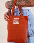 Mini Tote Bag in Paprika on Jesse's arm