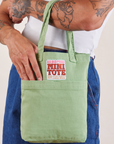 Sage Green Mini Tote Bag on Jesse's arm