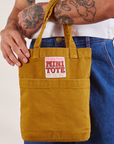 Mini Tote Bag in Spicy Mustard on Jesse's arm