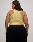 Back view of the Butter Yellow Deep Cut Racerback on Kristen