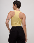 Back view of the Butter Yellow Deep Cut Racerback on Alex