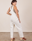 Angled back view of Original Overalls in Vintage Tee Off-White and khaki grey Tank Top worn by Tiara
